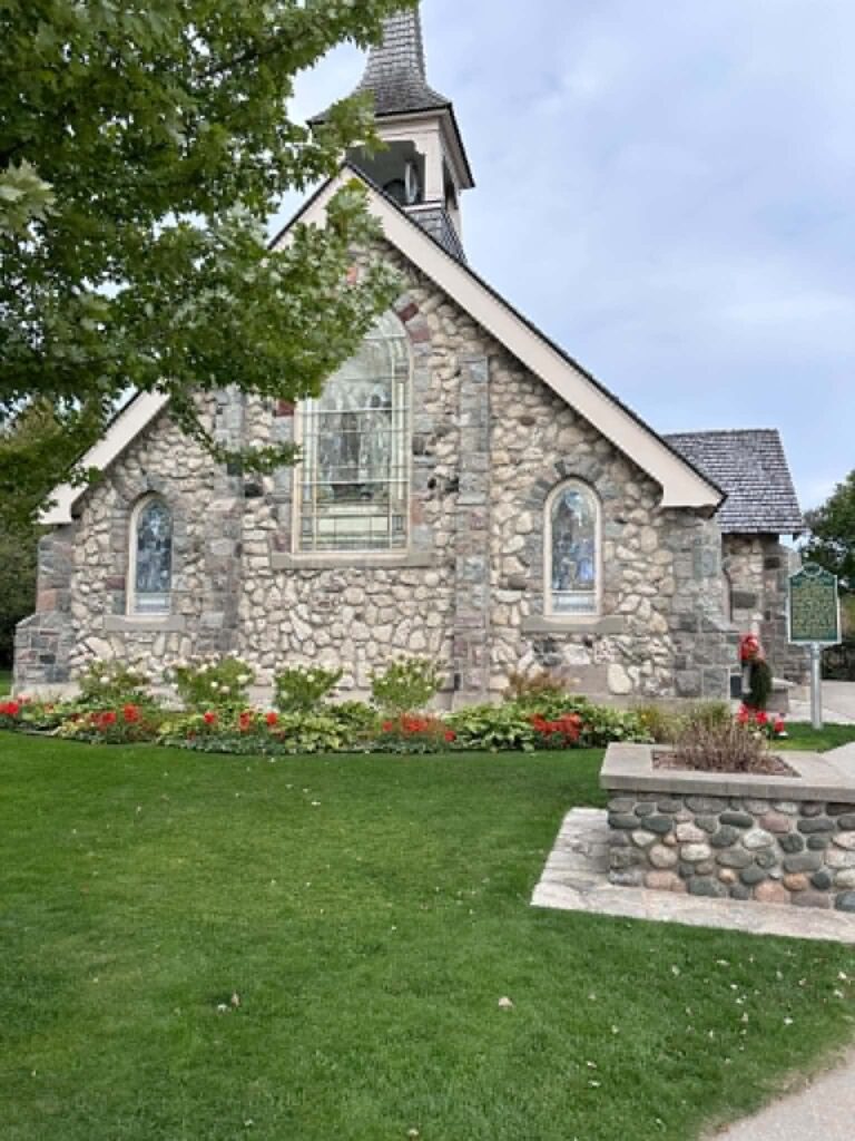 The Little Stone Church, a historic fieldstone chapel on Mackinac Island in early October