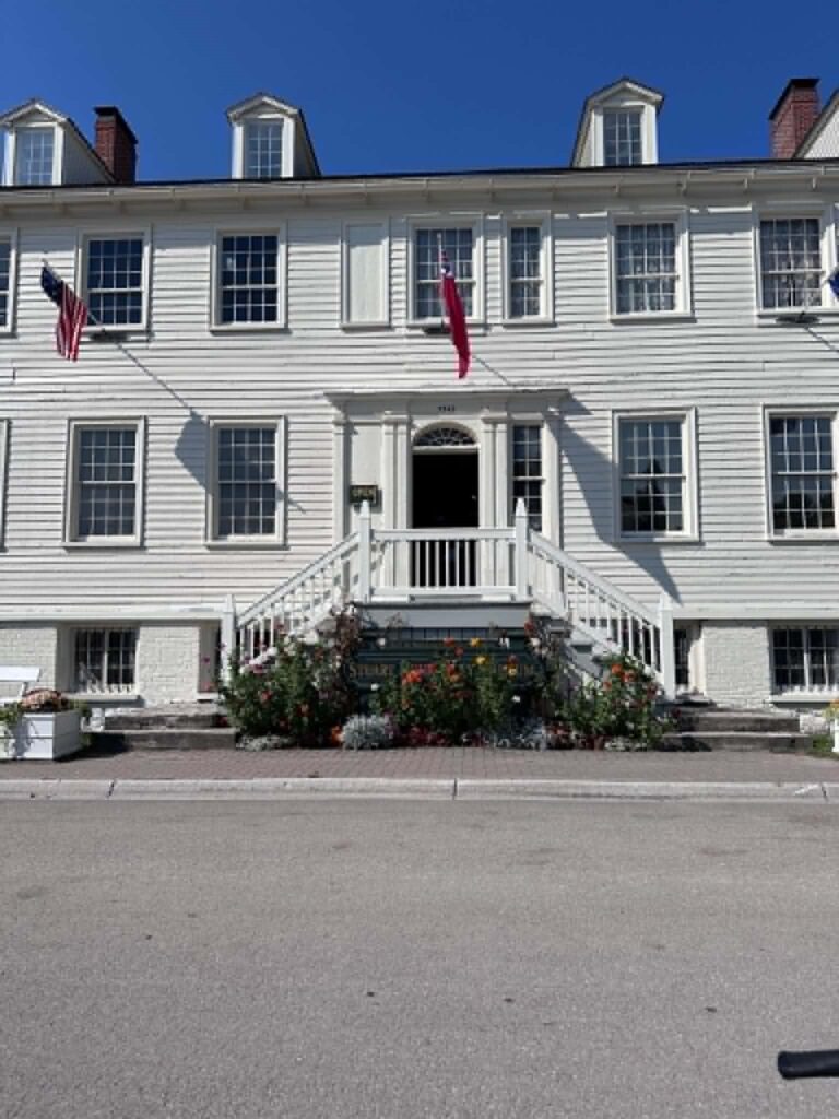 The Stuart House City Museum, a historic clapboard building on Mackinac Island