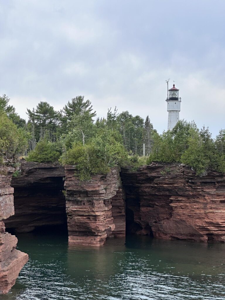 Apostle Islands sea caves and lighthouse from Lake Superior