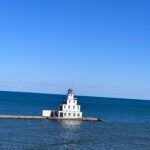 Manitowoc Wisconsin breakwater lighthouse on Lake Michigan seen from SS Badger ferry upper deck arriving Wisconsin