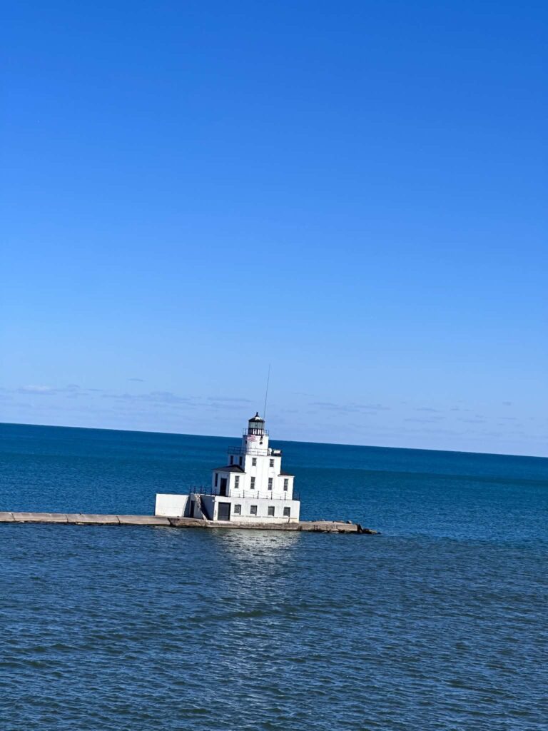 Manitowoc Wisconsin breakwater lighthouse on Lake Michigan seen from SS Badger ferry upper deck arriving Wisconsin