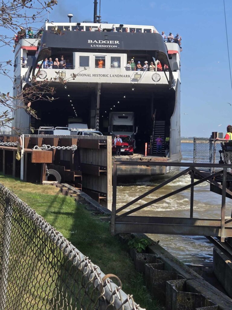 SS Badger National Historic Landmark car ferry unloading at Manitowoc Wisconsin dock passengers on deck 2026